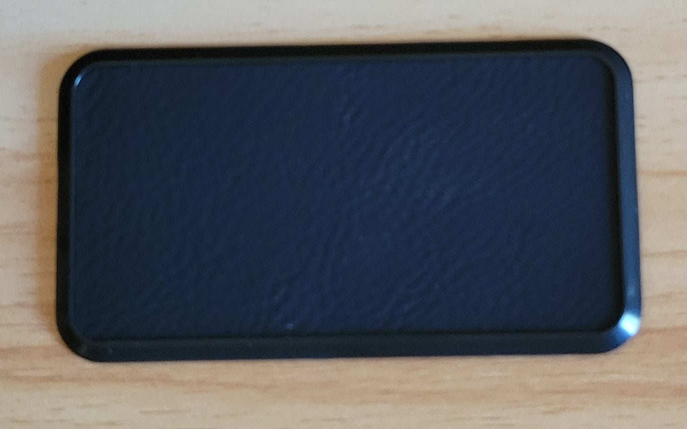 Custom engraved framed leather name tag / badge.