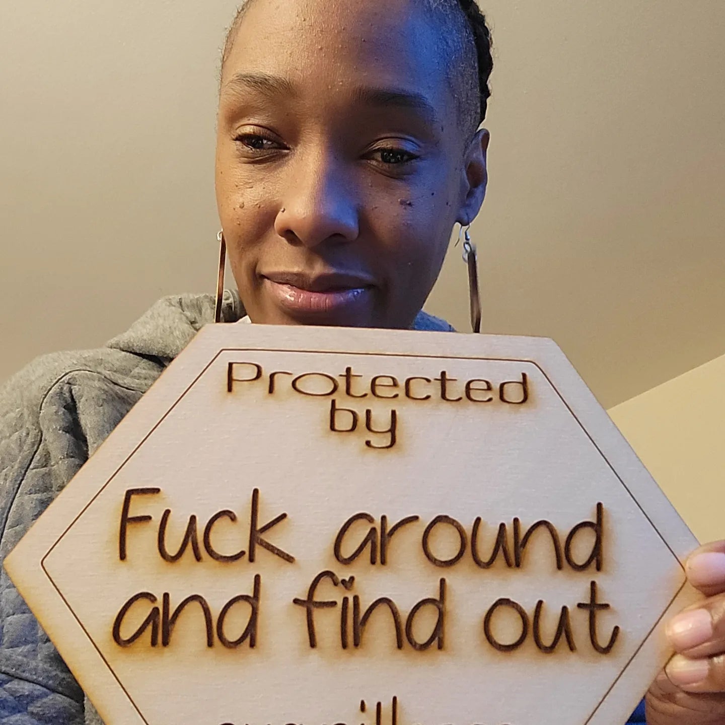 Protected by fuck around and find out surveillance sign