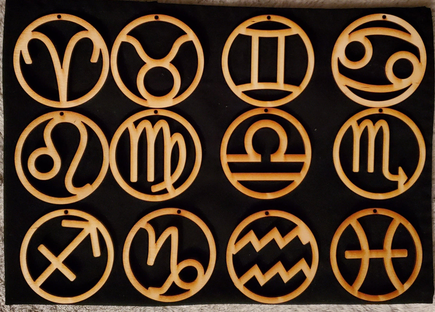 Zodiac or Name earrings $7